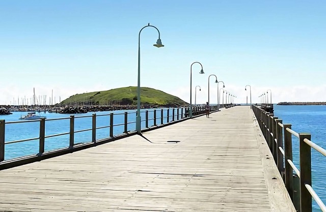 This unique level home is situated on the upper level in a private setting, with mountain views