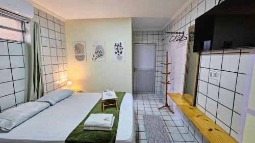 Tiny House - Centro d convenções700m, AC, Wifi, Garagem