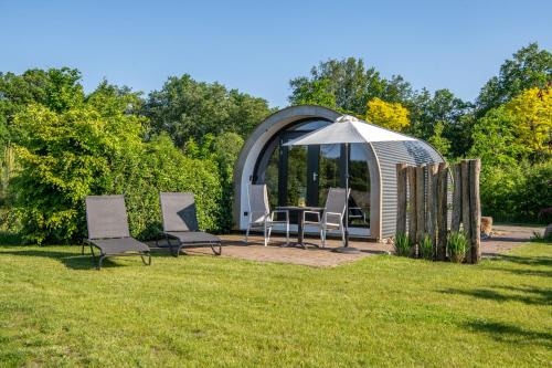 Tiny Natuurlodge voor 2 personen met vrij uitzicht over landerijen