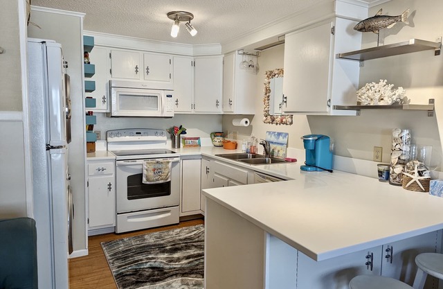 Top Rated Beautiful Updated Ocean Block Condo!
