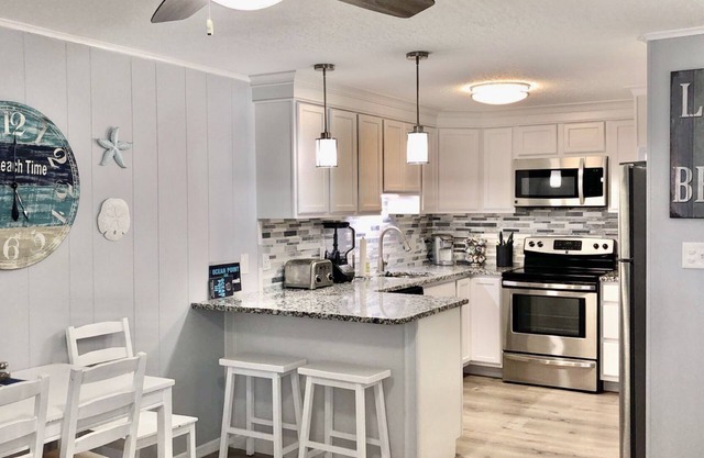 Top Rated! Newly Remodeled Ocean Block Condo in Perfect Mid-Town Location