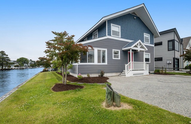 Town of South Bethany corner canal-front home 6 bedroom, 4.5 baths, private dock