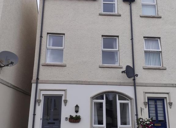 Townhouse, by the sea