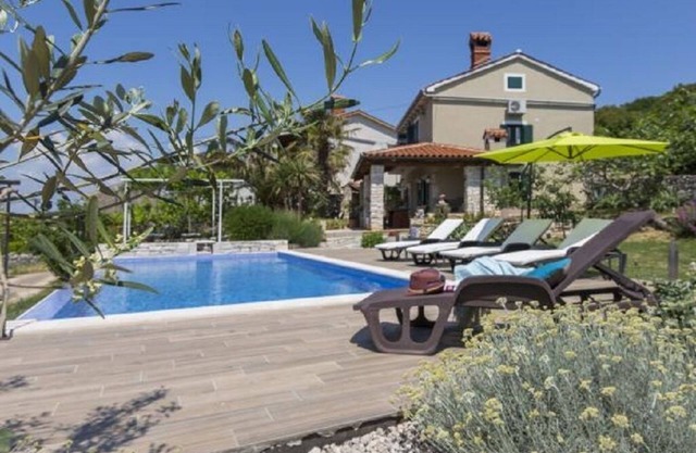 Traditional Istrian house with a nice garden, pool and sea view