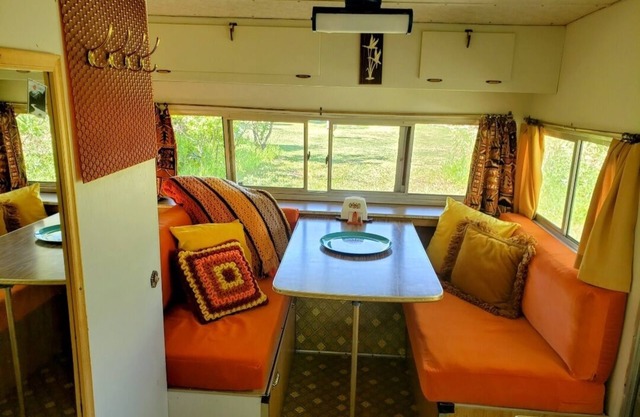 Travel back in time and camp like its 1970! Camper outfitted with 1970s gear.