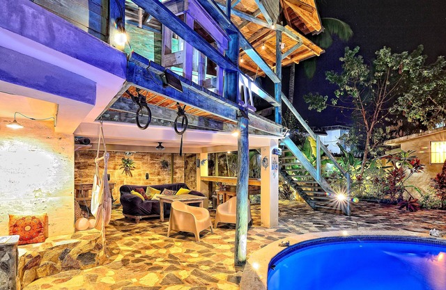 Tropical guesthouse by the pool in the lush garden and best area close to beach.
