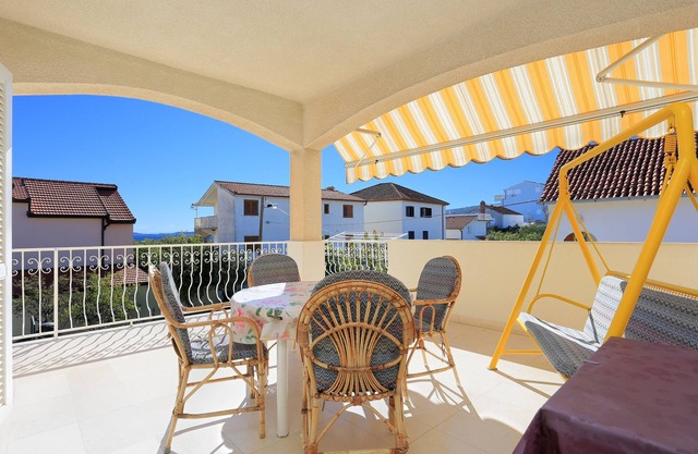 Two bedroom apartment with terrace and sea view Seget Vranjica, Trogir (A-18487-c)