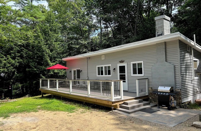 Two bedroom cottage with views of Bow Lake, steps to beach and boat launch.