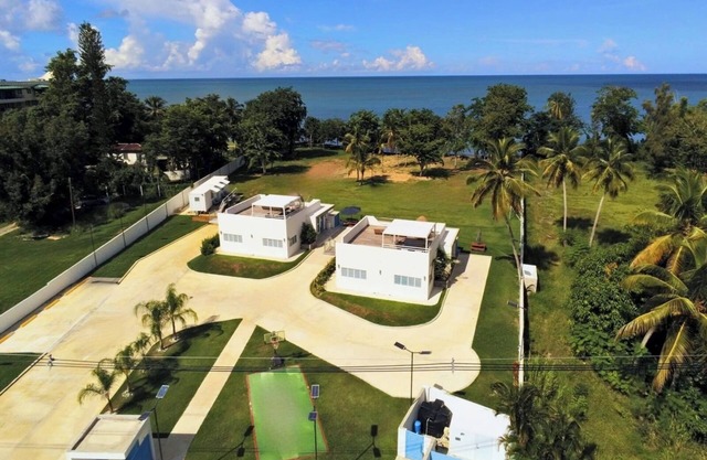 Two private beachfront houses, sleeps 12, kayaks