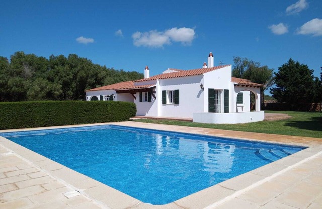 Typical Menorcan house next to virgin coves