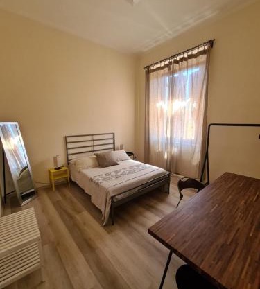 Una camera in città