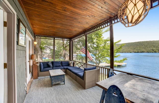 Unique & charming lakefront home with screened-in patio