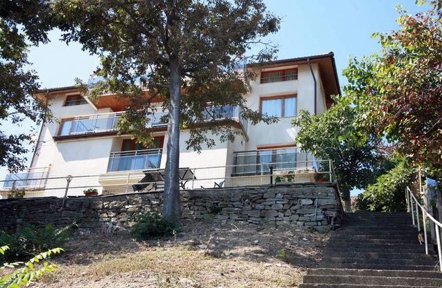 Unique private villa with three apartments right on the largest sandy beach