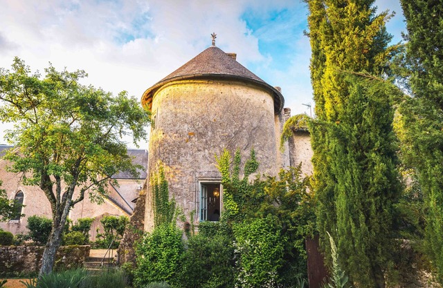 Uniquely French 14th Century Tower in rural village with spiral staircases!