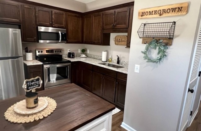 Unit 102, Newly built one story apartment on the edge of town.