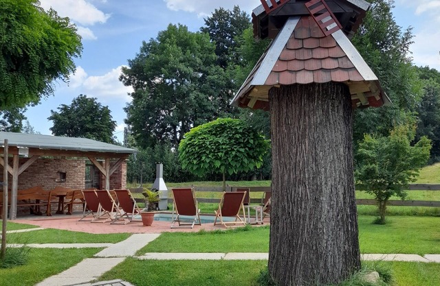 Vacation home with pool, garden, covered barbecue area and large dining table