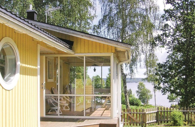 Very nice and cozy cottage overlooking lake Viken with its own beach and bridge.