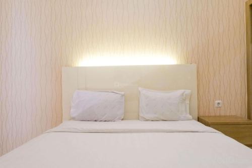 Vibrant Modern Studio Room at Bale Hinggil Apartment By Travelio