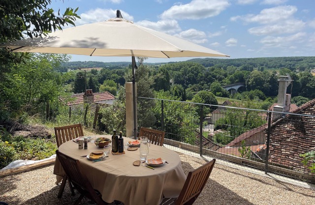 Village house overlooks valley