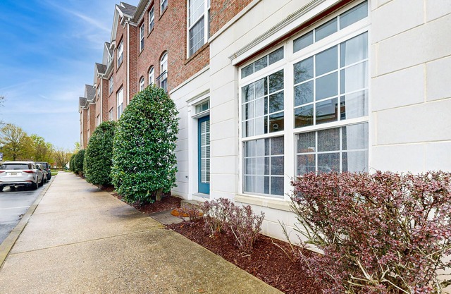 Village of Five Points townhouse with community pool, gym, and tennis access