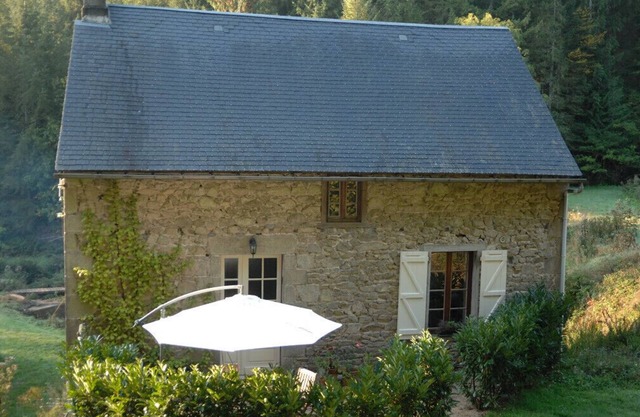 Water Mill set in a private valley with outdoor communal pool.
