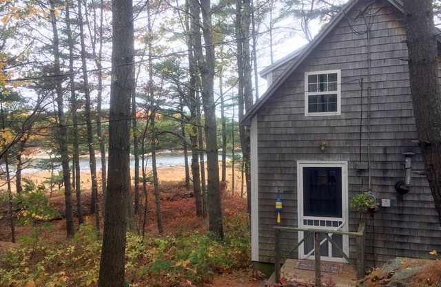 Waterfront Cottage with Screened Porch surrounded by conservation land