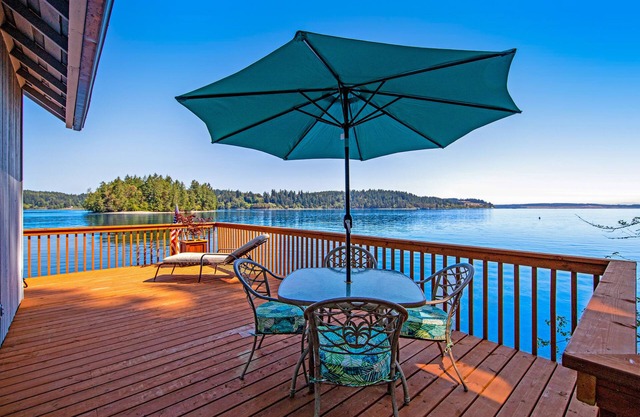 Waterfront Home w/Wraparound Deck, Grill, Pellet Stove, & Private Beach