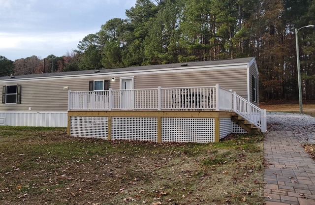 Waterfront mobile home on beautiful Lake Gaston with private pier access.
