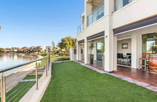 WATERFRONT, pontoon, golf, beach, kids play area.