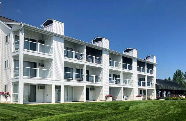 Waterfront Setting w/Top-Floor Views Overlooking Lake Charlevoix