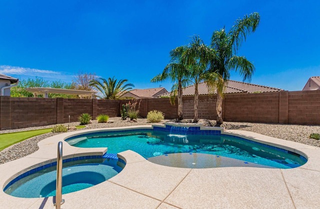 Welcome NASCAR Fans! Come chill by the pool in this Estrella Mtn Ranch designers home!