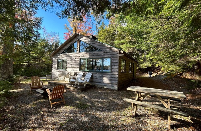 Welcoming 4-bedroom lake front cabin in charming Otis on Beech Hill Pond.