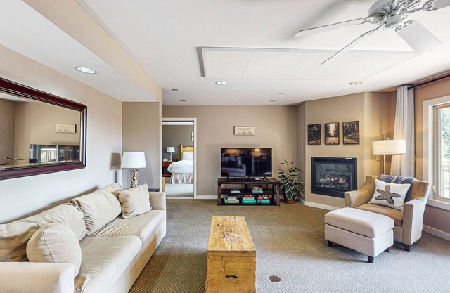 Wonderful escape with water access, three balconies, W/D, & gas fireplace