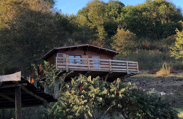 Wooden chalet in the heart of nature near a farm