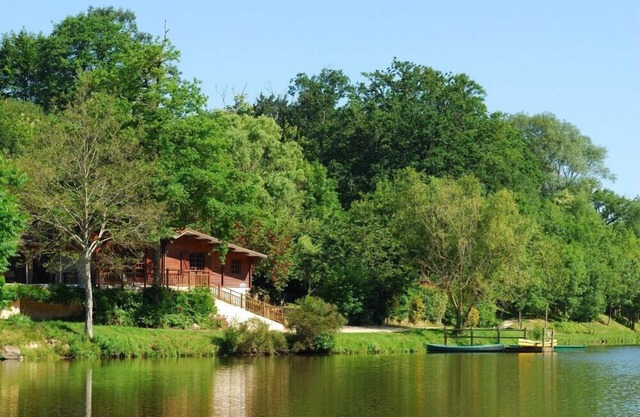 Wooden cottage on the water