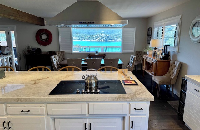Xanadu Lakefront Retreat with covered private dock and slide in its own cove!