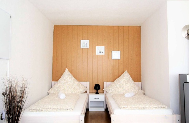 Z01 fitter's house in Zülpich center with open-plan living and dining area