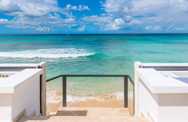 ZenBreak Nirvana is a luxury contemporary 5 bedroom beachfront villa