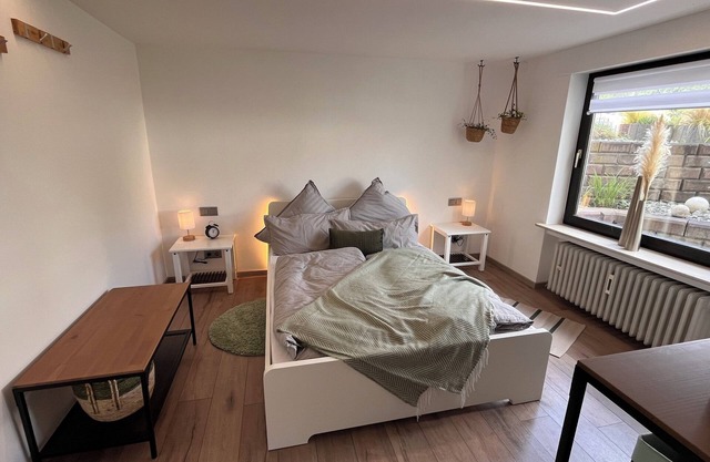 Zentrumnahe Ferienwohnung mit Garten und Stellplatz