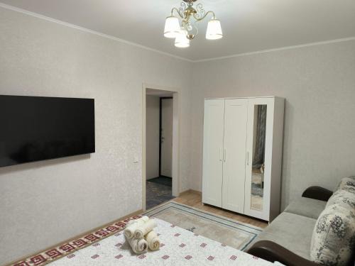 Almaty District Apartment | Квартира рядом Новый вокзал Нурлы жол и мечеть Хазрет Султан, быстрый Wi-fi