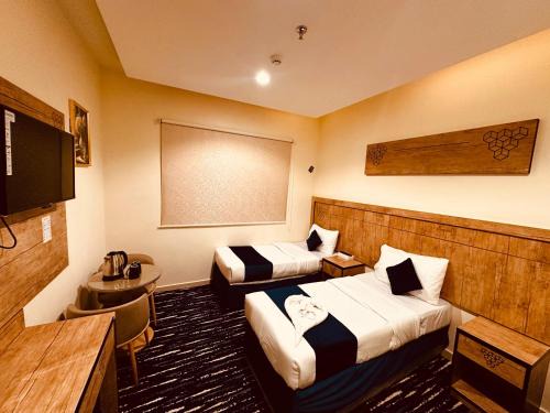 Mecca Hotel | فندق النمارق المتميزة