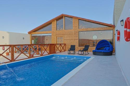 Dhahban Ski Chalet | منتجع سي فيو - sea view cottages