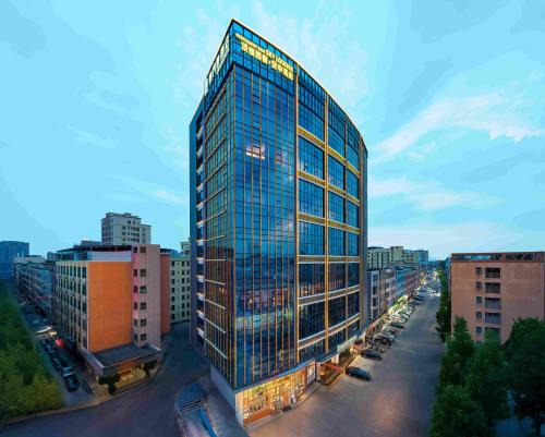 Qishi Hotel | 东莞企石康门紫酒店