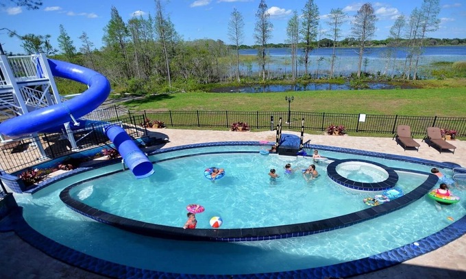 Clermont House | 10 Acre Lakefront Mansion Sleeps Up to 45 - Waterslide & Lazy River