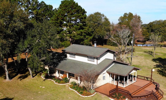 Bellville House | 100-acre ranch with beautiful creek, ponds, woods, livestock