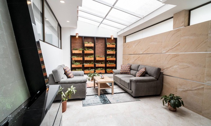 Barrios Unidos Hotel | 100 Wonderful House