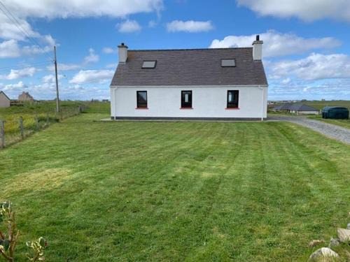 Isle of Lewis House | 18 Cross Skigesrta Road