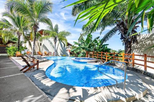 Coco Sunset Hills Apartment | 2-BD Beauty with Pool, Walk to Beach