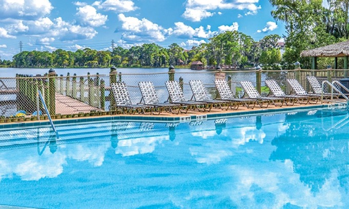 Florida Central Atlantic Coast Condo | 2 BDRM~ ON LAKE BRYAN~ DISNEY 7 MILES, 5 MILES TO SEAWORLD, POOLS/FISHING & MORE