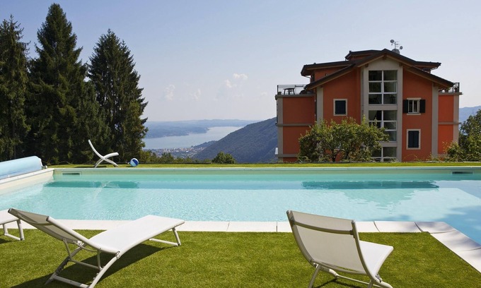 Comero Apartment | 2-bedroom corner apartment in a prestigious villa from 1850 with solar-heated pool